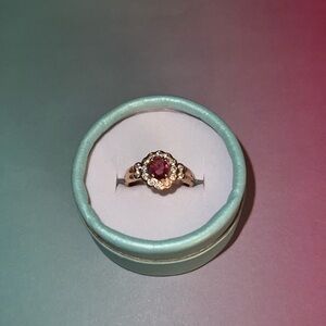 RBP2894 Stunning design featuring lab created garnet on a double rose gold Sz:9